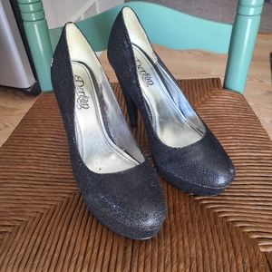 Shiny black heels